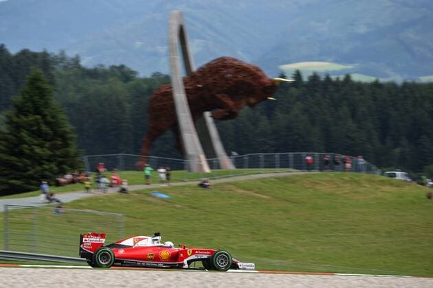 FORMULA 1 - GP of Austria 2016 SPIELBERG,AUSTRIA,01.JUL.16 - MOTORSPORTS, FORMULA 1 - Grand Prix of Austria, Red Bull Ring, free practice. Image shows Sebastian Vettel (GER Ferrari). Keywords: iron Red Bull sculpture. GEPAxpictures xDanielxGoetzhaber