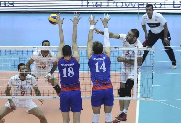 TEHRAN, Hamzeh Zarini (2nd R) of Iran spikes the ball during the match against Serbia at FIVB Men s Volleyball World League 2016 at Azadi Stadium in Tehran, Iran, on July 1, 2016. Iran won 3-2. ) (SP)IRAN-TEHRAN-VOLLEYBALL-WORLD LEAGUE-IRAN VS SREBIA AhmadxHalabisaz 