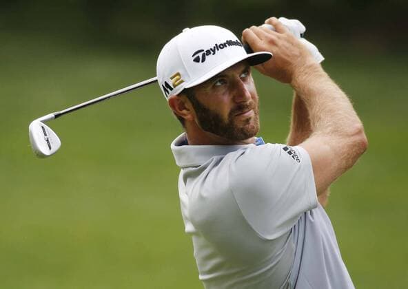 July 2, 2016 - Akron, OH, USA - Dustin Johnson watches his approach shot on the 16th hole during the third round of the Bridgestone Invitational at Firestone Country Club in Akron, Ohio, on Saturday, July 2, 2016. Bridgestone Invitational, third round - ZUMAm67_