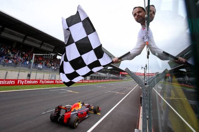 FORMULA 1 - GP of Austria 2016 SPIELBERG,AUSTRIA,03.JUL.16 - MOTORSPORTS, FORMULA 1 - Grand Prix of Austria, Red Bull Ring. Image shows the flagman and Max Verstappen (NED Red Bull Racing). GEPAxpictures xChristianxWalgram