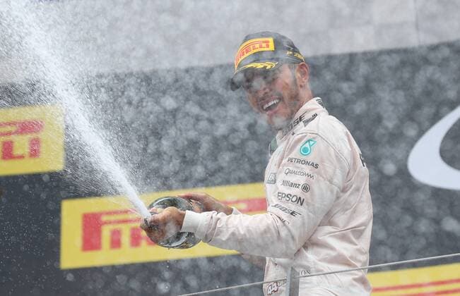FORMULA 1 - GP of Austria 2016 SPIELBERG,AUSTRIA,03.JUL.16 - MOTORSPORTS, FORMULA 1 - Grand Prix of Austria, Red Bull Ring. Image shows the rejoicing of Lewis Hamilton (GBR Mercedes GP). Keywords: champagne. GEPAxpictures xChristianxWalgram