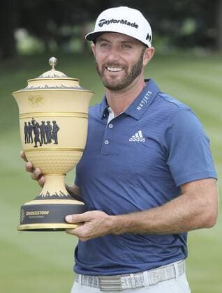 July 3, 2016 - Akron, OH, USA - Dustin Johnson holds the winner s trophy after winning the Bridgestone Invitational golf tournament by a single stroke on Sunday, July 3, 2016, at Firestone Country Club in Akron, Ohio. Bridgestone Invitational - ZUMAm67_