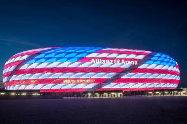 MUNICH, GERMANY - JULY 04: The Allianz Arena is illuminated with the flag of the United States of America to celebrate the Independance Day on July 4, 2016 in Munich, Germany.