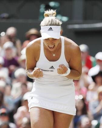 Bilder des Tages - SPORT Tennis: Kerber reaches Wimbledon semifinals Angelique Kerber celebrates her 7-5, 7-6(2) victory over Simona Halep of Romania in the quarterfinals of the Wimbledon championships in London on July 5, 2016. Kerber will play Venus Williams next. 