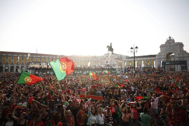 Portugal national soccer team supporters react to their soccer team s match on the Semi-final of the Euro 2016, between Portugal and Wales, in a public screening in downtown Lisbon, Portugal, on July 6, 2016. Photo by Pedro Nunes Euro 2016 Portugal Fans  PN