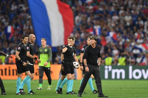 Bundestrainer Joachim Jogi LOEW,LÖW (re,GER) geht nach Spielende ueber den Platz mit dem Schiedsrichtergespann um Nicola RIZZOLI (ITA,mit Ball), Halbfinale Spiel M50 Deutschland (GER)-Frankreich (FRA) 0-2 am 07.07.2016 in Marseille,Stade Velodrome Fussball EM 2016 in Frankreich vom 10.06. - 10.07.2016.