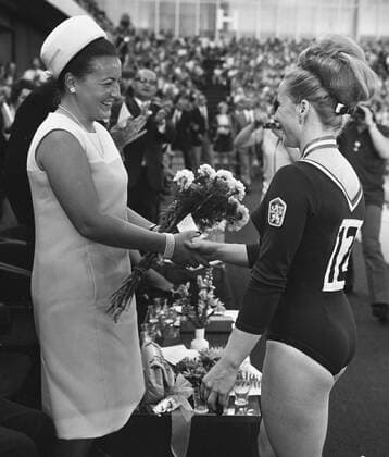 Princess Margriet (left) of Netherlands receives flowers for winner from one of Czechoslovakia s most famous sportswomen Vera Caslavska during the European Championship EM Europameisterschaft in Amsterdam, Netherlands, May, 1967. (CTKxPhoto JanxBarta) CTKPhotoFO01221168 