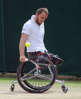 Tennis - 2016 Wimbledon Championships - Week Two, (Day Thirteen) Mens doubles Wheelchair Final Stephane Houdet (FRA) and Nicolas Peifer (FRA) v Alfie Hewett (GBR) and Gordon Reid (GBR) Nicolas Peifer on court 17 COLORSPORT ANDREW COWIE 