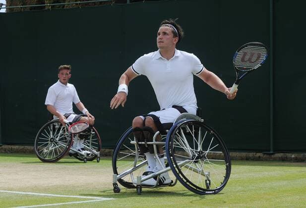 Tennis - 2016 Wimbledon Championships - Week Two, (Day Thirteen) Mens doubles Wheelchair Final Stephane Houdet (FRA) and Nicolas Peifer (FRA) v Alfie Hewett (GBR) and Gordon Reid (GBR) Alfie Hewett and Gordon Reid (right) on court 17 COLORSPORT ANDREW COWIE 