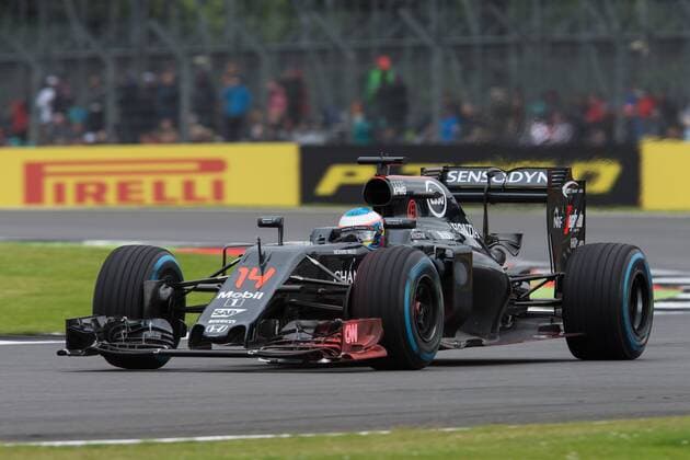 09.07.2016. Silverstone, Northants, England. Formula One British Grand Prix Qualifying on a damp circuit. McLaren Honda Formula 1 Team driver Fernando Alonso runs with red aero paint on nose section. xTimxWilliamsx  ActionPlus11759834