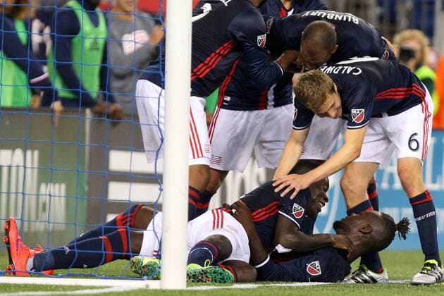 July 9, 2016; Foxborough, MA, USA; New England Revolution forward Kei Kamara (13) celebrates with teammates after scoring a a goal during the second half of an MLS Fussball Herren USA game between the New England Revolution and Columbus Crew at Gillette Stadium. New England defeated Columbus 3-1. MLS 2016: Crew vs Revolution JUL 09 - ZUMAc04_