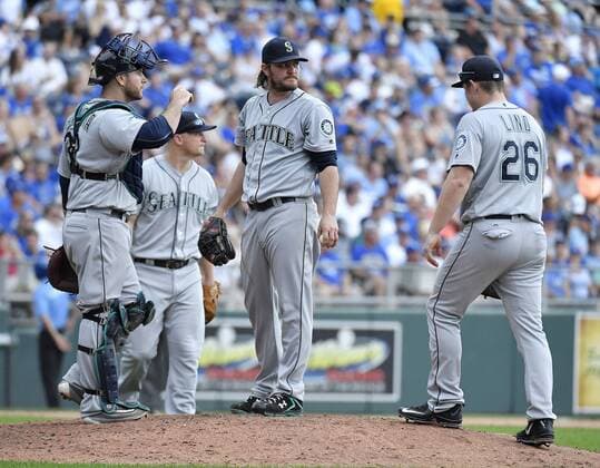 July 9, 2016 - Kansas City, MO, USA - Seattle Mariners starting pitcher Wade Miley waits to be relieved in the sixth inning against the Kansas City Royals on Saturday, July 9, 2016, at Kauffman Stadium in Kansas City, Mo. The Royals won, 5-3. Seattle at Kansas City - ZUMAm67_