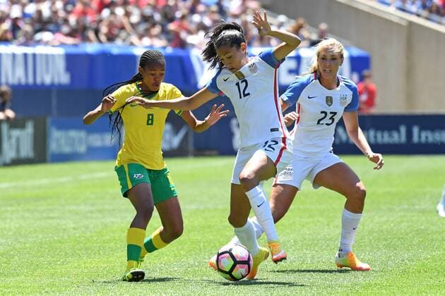 09 July 2016: South Africa midfielder Linda Motlhalo (8) watches United States forward Christen Press (12) control the ball next to United States midfielder Allie Long (23) during a game between South Africa and USA at Soldier Field in Chicago, IL. (Photo by Patrick Gorski Icon Sportswire) SOCCER: JUL 09 Women s - South Africa v USA Icon09071640 EDITORIAL USE ONLY