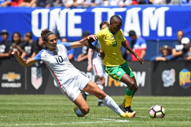 09 July 2016: South Africa midfielder Nompumelelo Nyandeni (18) controls the ball next to United States midfielder Carli Lloyd (10) during a game between South Africa and USA at Soldier Field in Chicago, IL. (Photo by Patrick Gorski Icon Sportswire) SOCCER: JUL 09 Women s - South Africa v USA Icon09071619 EDITORIAL USE ONLY