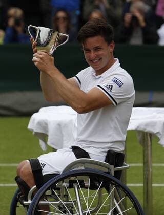 10.07.2016. All England Lawn Tennis and Croquet Club, London, England. The Wimbledon Tennis Championships Day 14. The Final of the Men s Wheelchair Singles between Stefan Olssen (SWE) and Gordon Reid (GBR). Gordon Reid with trophy as wins the inaugural final in straight sets. xAlanxMartinx  ActionPlus11760313