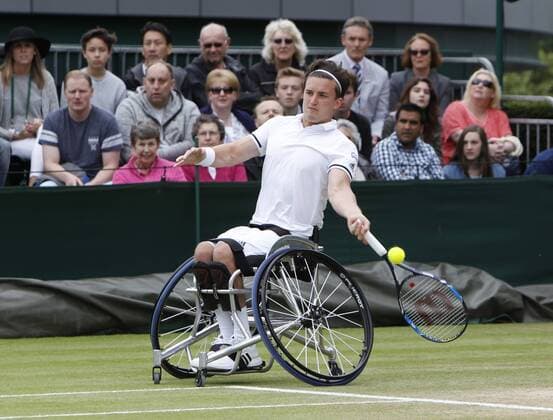 10.07.2016. All England Lawn Tennis and Croquet Club, London, England. The Wimbledon Tennis Championships Day 14. The Final of the Men s Wheelchair Singles between Stefan Olssen (SWE) and Gordon Reid (GBR). Gordon Reid hits a forehand as he wins the final in straight sets. xAlanxMartinx  ActionPlus11760314