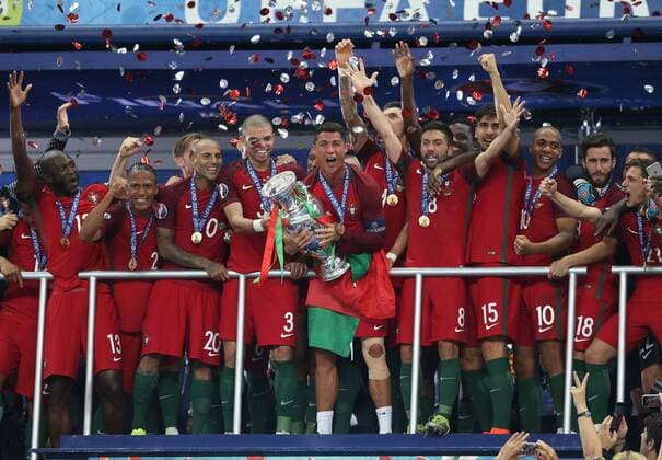 Cristiano Ronaldo of Portugal lifts the European Championship EM Europameisterschaft trophy during the UEFA European Championship 2016 final match at the Stade de France, Paris. Picture date July 10th, 2016 Pic David Klein Sportimage EDITORIAL USE ONLY. No use with unauthorised audio, video, data, fixture lists, club league logos or live services. Online in-match use limited to 120 images, no video emulation. No use in betting, games or single club league player publications.