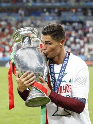 Cristiano Ronaldo of Portugal with Coupe Henri Delaunay during the UEFA EURO EM Europameisterschaft Fussball 2016 final match between Portugal and France on July 10, 2016 at the Stade de France in Paris, France. Portugal v France UEFA EURO 2016 final 2016 2017 xVIxxIVx 5831786