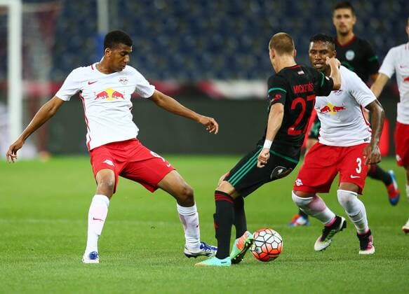 SOCCER - CL quali, RBS vs Liepaja SALZBURG,AUSTRIA,12.JUL.16 - SOCCER - UEFA Champions League, qualification, Red Bull Salzburg vs FK Liepaja. Image shows Bernardo Fernandes da Silva Junior (RBS), Romans Mickevics (Liepaja) and Paulo Miranda (RBS). GEPAxpictures xFelixxRoittner