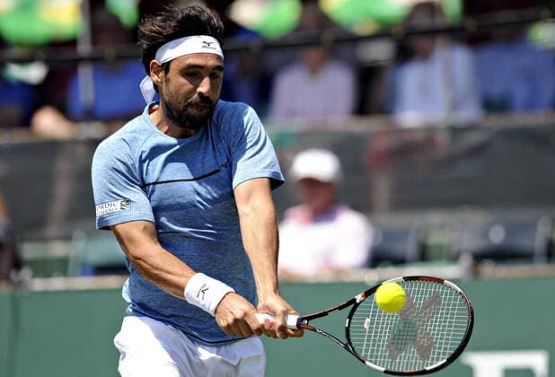 July 13, 2016: Marcos Baghdatis (CYP) hits a backhand in his round of 16 match vs. Brian Baker (USA) at the 2016 Hall of Fame Championships held at the Casino at Newport, R.I. This ATP Tennis Herren match was won by Baghdatis 6-4, 6-3. Tennis 2016: Hall of Fame Championships JUL, 16 - ZUMAc04_