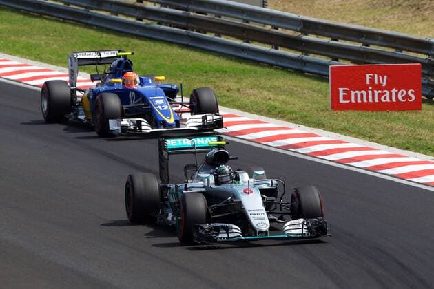 Formel 1, GP Ungarn, Freies Training Hungarian Grand Prix, Hungaroring, Budapest 21 - 24 July 2016 23.07.2016 - Free Practice 3, Nico Rosberg (GER) Mercedes AMG F1 W07 Hybrid and Felipe Nasr (BRA) Sauber C34 