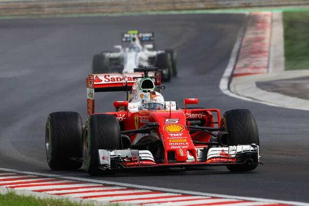 Hungarian Grand Prix, Hungaroring, Budapest 21 - 24 July 2016 23.07.2016 - Qualifying, Sebastian Vettel (GER) Scuderia Ferrari SF16-H leads Valtteri Bottas (FIN) Williams FW38 