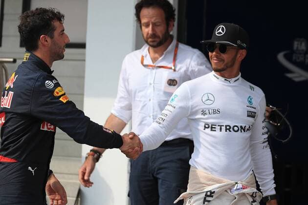 23.07.2016. The Hungaroring Mogyor& xf3;d, Hungary. Formula 1 grand prix of Hungary, qualifying sessions. Mercedes AMG Petronas - Lewis Hamilton shakes Daniel Ricciardo hand. In a wet and disjointed session, the course was red flagged multiple times, due to standing water on the track. Rosberg took pole as Hamilton was held up on his final qualifying lap and Hamilton was 2nd. xLeannexBoonx  ActionPlus11764439