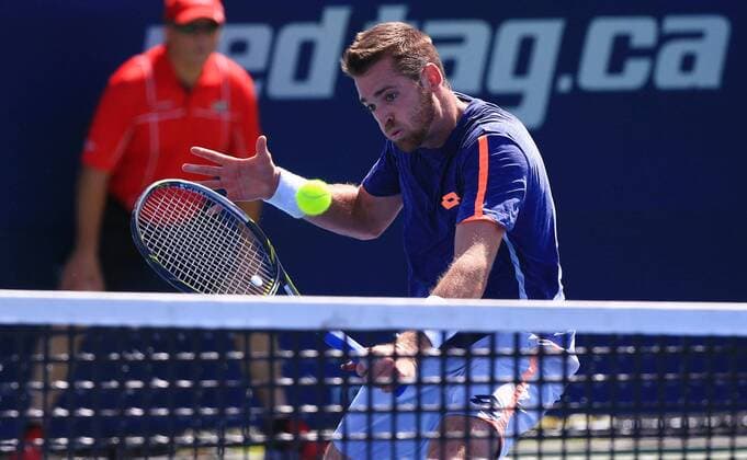 TORONTO, July 23, 2016 -- Austin Krajicek of the United States returns the ball against Michael Mmoh of the United States during the first round of men s singles qualifying match at the 2016 Rogers Cup in Toronto, Canada, July 23, 2016. Austin Krajicek won 2-0. )(hcs) (SP)CANADA-TORONTO-TENNIS-ROGERS CUP-MEN S SINGLES-QUALIFYING ZouxZheng 