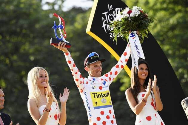 Tour de France, Siegerehrung Gesamtwertungen Polish Rafal Majka of Tinkoff celebrates on the podium in the red polka-dot jersey for best climber after the 21st and last stage of the 103rd edition of the Tour de France cycling race, 113 km from Chantilly to the Champs-Elysees in Paris, France, on Sunday 24 July 2016. This year s Tour de France takes place from July 2nd to July 24th. YORICKxJANSENS  x04898177x