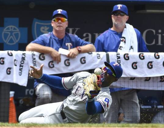 July 24, 2016 - Kansas City, MO, USA - Texas Rangers third baseman Jurickson Profar loses a foul ball off the bat of Kansas City Royals Jarrod Dyson in the third inning Sunday, July 24, 2016 at Kauffman Stadium in Kansas City, Mo. Royals fall to Rangers after Soria stumbles again - ZUMAm67_