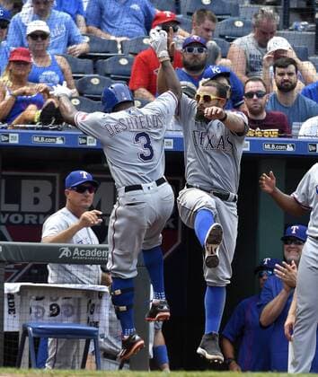 July 24, 2016 - Kansas City, MO, USA - Texas Rangers Delino DeShields celebrates his solo home run with Rougned Odor in the sixth inning Sunday, July 24, 2016 at Kauffman Stadium in Kansas City, Mo. Royals fall to Rangers after Soria stumbles again - ZUMAm67_