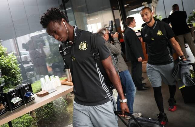 Anderlecht s Idrissa Sylla and Anderlecht s Sofiane Hanni pictured during the departure of Belgian first league soccer team RSC Anderlecht, Monday 25 July 2016 in Brussels airport, on their way to Rostov, Russia. Tomorrow Anderlecht is playing the first leg of the third qualification round for the Champions League competition against Russian team FC Rostov. VIRGINIExLEFOUR  x04898416x
