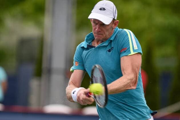 July 25, 2016: Kevin Anderson of South Africa returns the ball to Viktor Troicki of Serbia & Montenegro during their first round match of the Rogers Cup tournament at the Aviva Centre in Toronto, Ontario, Canada on July 25, 2016. Cal Media TENNIS 2016 - Rogers Cup Toronto July 25 - ZUMAc04_