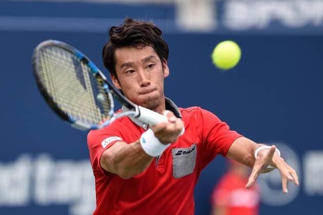 July 25, 2016: Yuichi Sugita of Japan returns the ball to Grigor Dimitrov of Bulgaria during their first round match of the Rogers Cup tournament at the Aviva Centre in Toronto, Ontario, Canada on July 25, 2016. Cal Media TENNIS 2016 - Rogers Cup Toronto July 25 - ZUMAc04_