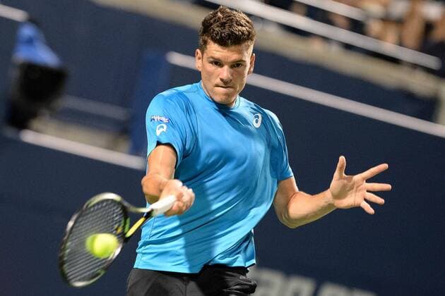 July 25, 2016: Frank Dancevic of Canada returns the ball to Sam Querrey of the United States during their first round match of the Rogers Cup tournament at the Aviva Centre in Toronto, Ontario, Canada on July 25, 2016. Cal Media TENNIS 2016 - Rogers Cup Toronto July 25 - ZUMAc04_