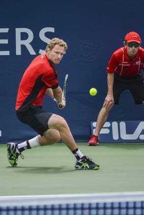 July 25, 2016 - Toronto, Ontario, Canada - Gilles Miller (White shirt) from Luxemburg defeats Dmitry Tursunov (Red Shirt) from Russia in 2 sets, advancing to the secound round of Rogers Cup Tennis Tournament in Toronto, Canada. Gilles Miller (White shirt) from Luxemburg defeats Dmitry Tursunov (Red Shirt) from Russia in 2 sets, advancing to the secound round of Rogers Cup Tennis Tournament in Toronto, Canada. - ZUMAd114