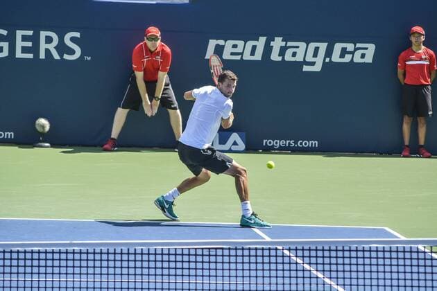 July 25, 2016 - Toronto, Ontario, Canada - Grigor Dimitrov from Bulgaria (White Shirt) defeats Yuichi Sugita from Japan, advancing to second round of Rogers Cup of Tennis in Toronto, Canada. Grigor Dimitrov from Bulgaria (White Shirt) defeats Yuichi Sugita from Japan, advancing to second round of Rogers Cup of Tennis in Toronto, Canada. - ZUMAd114