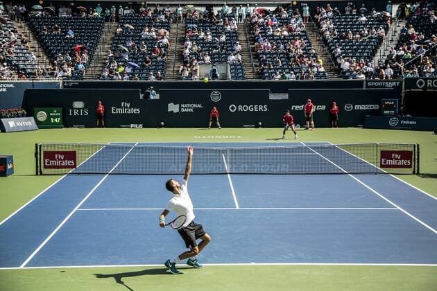 July 25, 2016 - Toronto, Ontario, Canada - Grigor Dimitrov from Bulgaria (White Shirt) defeats Yuichi Sugita from Japan, advancing to second round of Rogers Cup of Tennis in Toronto, Canada. Grigor Dimitrov from Bulgaria (White Shirt) defeats Yuichi Sugita from Japan, advancing to second round of Rogers Cup of Tennis in Toronto, Canada. - ZUMAd114