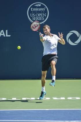 July 25, 2016 - Toronto, Ontario, Canada - Grigor Dimitrov from Bulgaria (White Shirt) defeats Yuichi Sugita from Japan, advancing to second round of Rogers Cup of Tennis in Toronto, Canada. Grigor Dimitrov from Bulgaria (White Shirt) defeats Yuichi Sugita from Japan, advancing to second round of Rogers Cup of Tennis in Toronto, Canada. - ZUMAd114