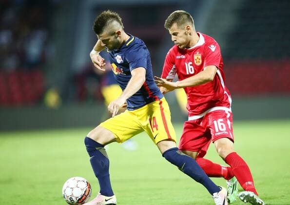 SOCCER - CL, quali, Tirana vs RBS ELBASAN,ALBANIA,26.JUL.16 - SOCCER - UEFA Champions League, qualification, FK Partizani Tirana vs Red Bull Salzburg. Image shows Valon Berisha (RBS) and Ylber Ramadani (Tirana). GEPAxpictures xFelixxRoittner