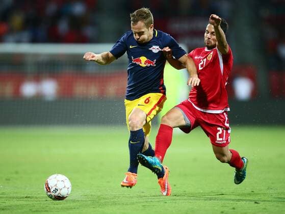 SOCCER - CL, quali, Tirana vs RBS ELBASAN,ALBANIA,26.JUL.16 - SOCCER - UEFA Champions League, qualification, FK Partizani Tirana vs Red Bull Salzburg. Image shows Christian Schwegler (RBS) and Agustin Torassa (Tirana). GEPAxpictures xFelixxRoittner