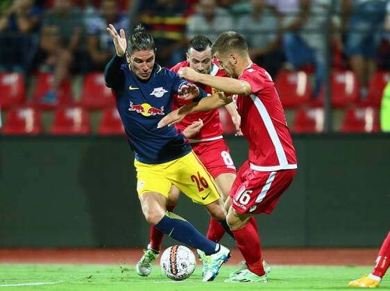 SOCCER - CL, quali, Tirana vs RBS ELBASAN,ALBANIA,26.JUL.16 - SOCCER - UEFA Champions League, qualification, FK Partizani Tirana vs Red Bull Salzburg. Image shows Jonatan Soriano (RBS) and Ylber Ramadani (Tirana). GEPAxpictures xFelixxRoittner