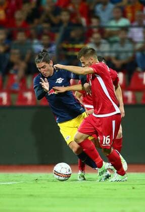 SOCCER - CL, quali, Tirana vs RBS ELBASAN,ALBANIA,26.JUL.16 - SOCCER - UEFA Champions League, qualification, FK Partizani Tirana vs Red Bull Salzburg. Image shows Jonatan Soriano (RBS) and Ylber Ramadani (Tirana). GEPAxpictures xFelixxRoittner