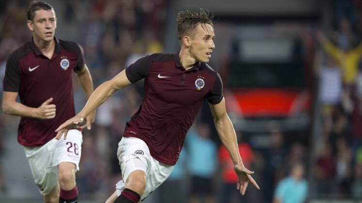 Josef Sural of Sparta, right, celebrates the first goal in the 3rd qualifying round of football Champions League, 1st leg: Sparta Praha vs Steaua Bucharest in Prague, Czech Republic, July 26, 2016. Pictured left is Ondrej Zahustel of Sparta. (CTKxPhoto MichalxKamaryt) CTKPhotoP201607260940601  kmt 4