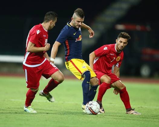 SOCCER - CL, quali, Tirana vs RBS ELBASAN,ALBANIA,26.JUL.16 - SOCCER - UEFA Champions League, qualification, FK Partizani Tirana vs Red Bull Salzburg. Image shows Emilian Vila (Tirana), Valon Berisha (RBS) and Realdo Fili (Tirana). GEPAxpictures xFelixxRoittner