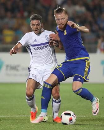 Anderlecht s Alexandru Chipciu and Rostov s Ivan Novoseltsev fight for the ball during the first leg of the third qualification round between Belgian first league soccer team RSC Anderlecht and Russian team FC Rostov in the Champions League competition, on Tuesday 26 July 2016, in Rostov-on-Don, Russia. VIRGINIExLEFOUR  x04899237x
