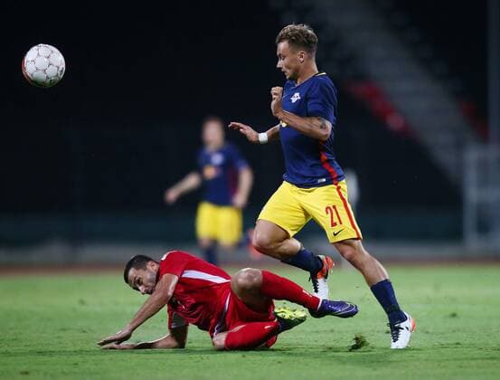 SOCCER - CL, quali, Tirana vs RBS ELBASAN,ALBANIA,26.JUL.16 - SOCCER - UEFA Champions League, qualification, FK Partizani Tirana vs Red Bull Salzburg. Image shows Renato Arapi (Tirana) and Fredrik Gulbrandsen (RBS). GEPAxpictures xFelixxRoittner