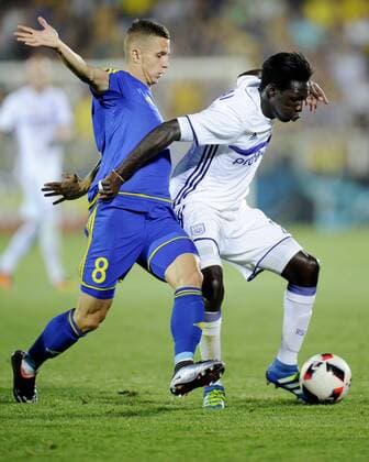 ROSTOV-ON-DON, RUSSIA - JULY 26, 2016: Rostov s Igor Kireyev (L) and Anderlecht s Fabrice N Sakala fight for the ball in Leg 1 of their 2016 17 UEFA Champions League Third qualifying round match at Olimp-2 Stadium. The game ended in a 2:2 draw. Valery Matytsin TASS  TS02AF3E