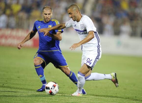 ROSTOV-ON-DON, RUSSIA - JULY 26, 2016: Rostov s Tsimafei Kalachou (L) and Anderlecht s Sofiane Hanni in Leg 1 of their 2016 17 UEFA Champions League Third qualifying round match at Olimp-2 Stadium. The game ended in a 2:2 draw. Valery Matytsin TASS  TS02AF43