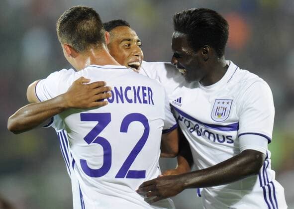 ROSTOV-ON-DON, RUSSIA - JULY 26, 2016: Anderlecht s Leander Dendoncker, Youri Tielemans and Fabrice N Sakala (L-R) celebrate scoring in Leg 1 of the 2016 17 UEFA Champions League Third qualifying round match against FC Rostov at Olimp-2 Stadium. The game ended in a 2:2 draw. Valery Matytsin TASS  TS02AF44